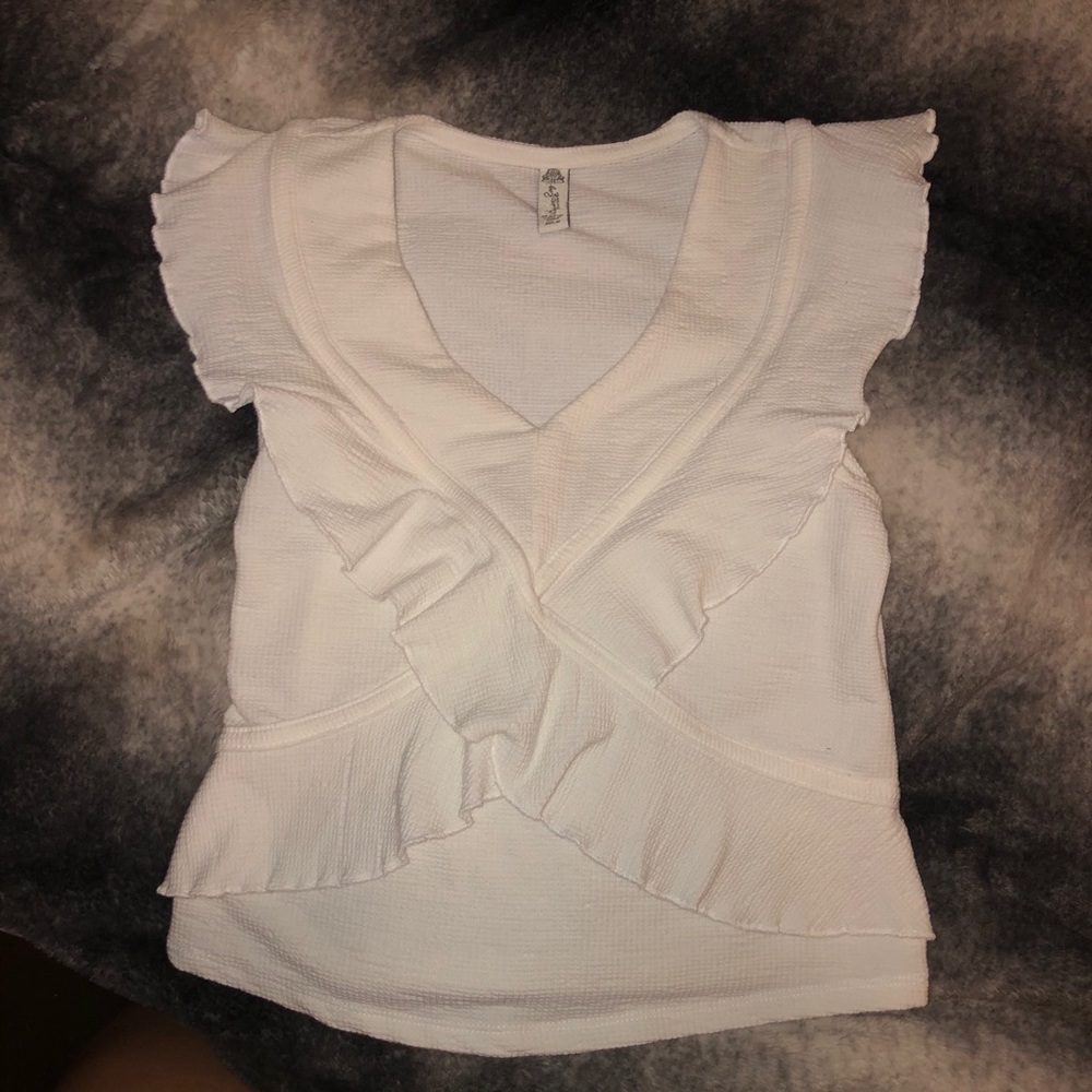 White frilly top